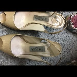 Neutral/ beige sling back Jimmy Choo shoes.